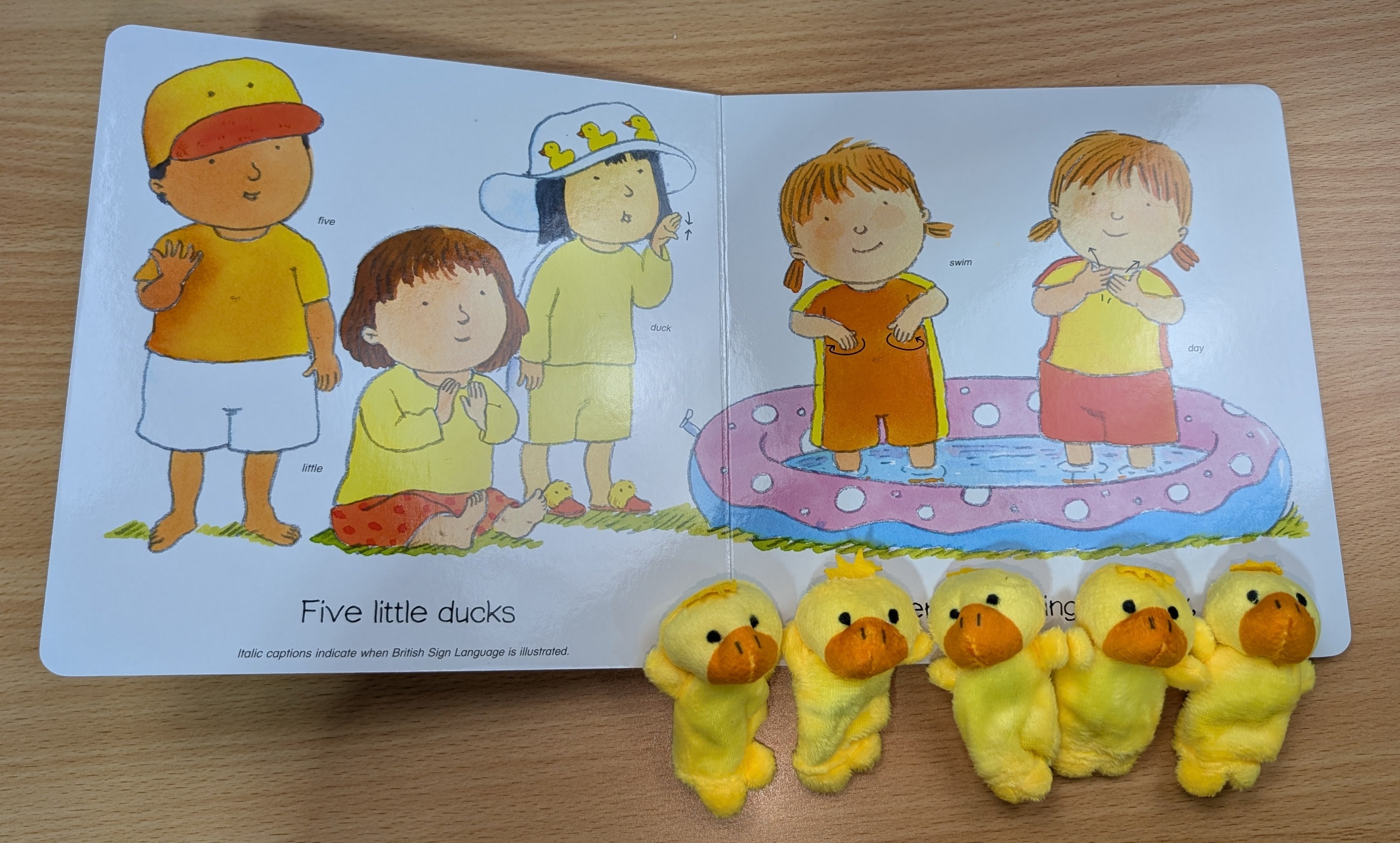 Five little ducks children's board book with illustrations of children signing (auslan-Australian sign language). plus 5 duck finger puppets