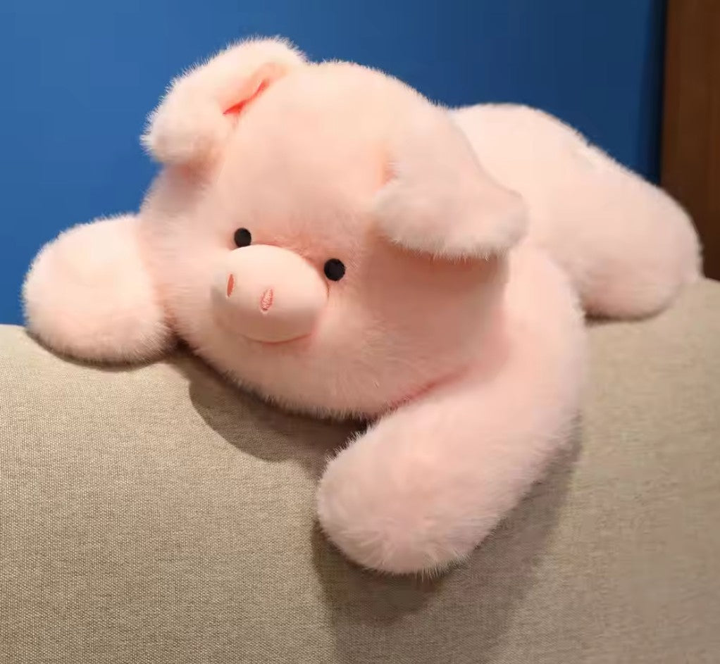 Pudgy Pig the long armed weighted sensory cuddle friend